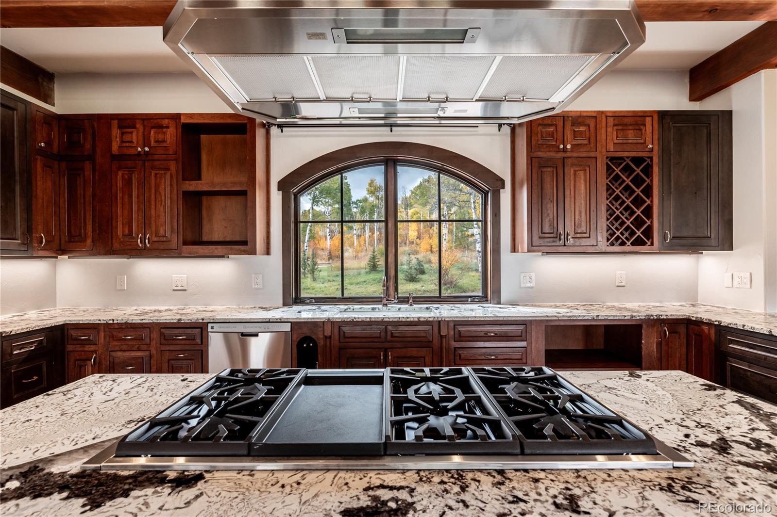 26050 Henderson Park Road Oak Creek, CO 80467 - Photo 12 of 40 a kitchen with a stove and a sink