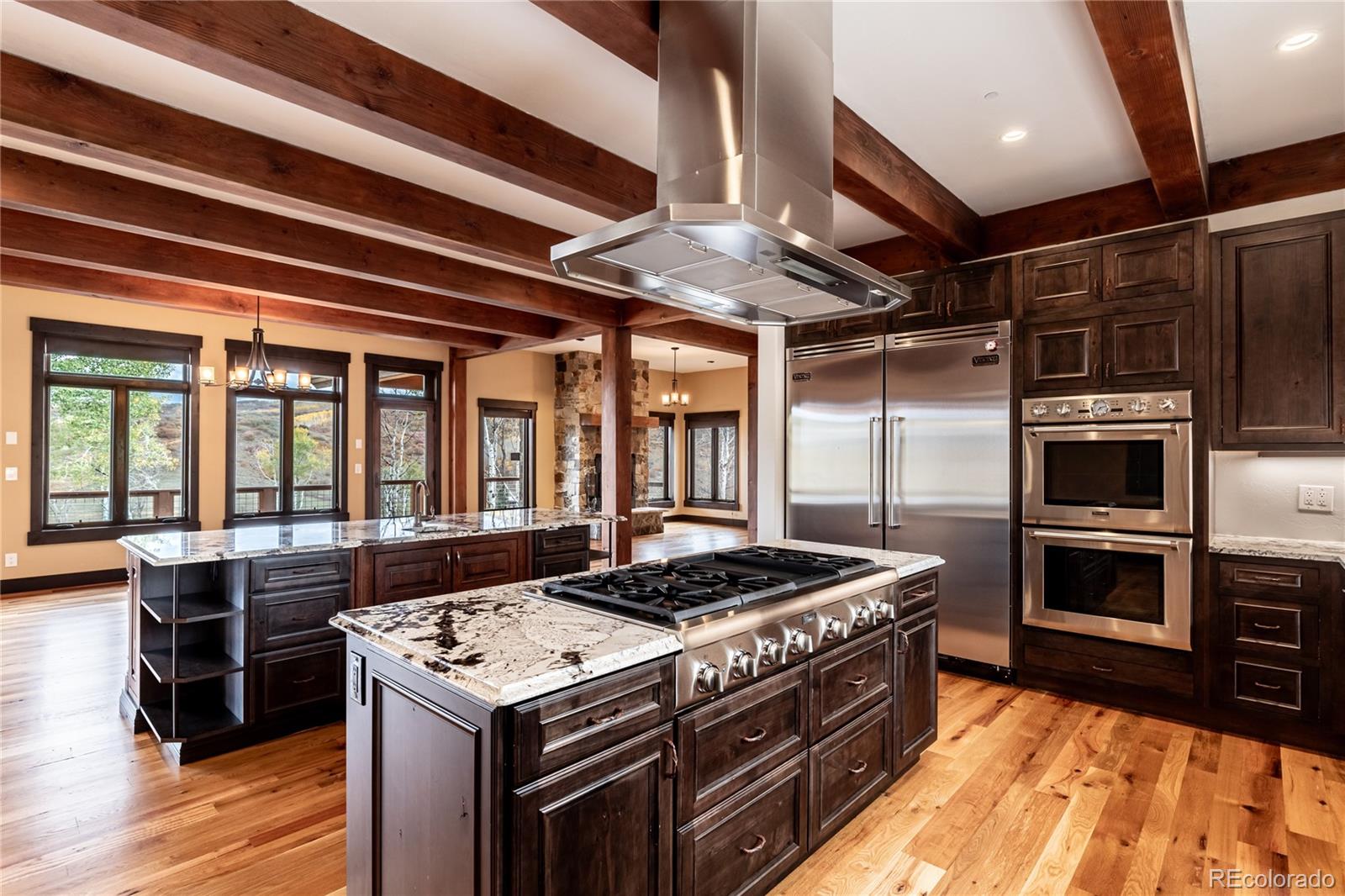 26050 Henderson Park Road Oak Creek, CO 80467 - Photo 14 of 40 a kitchen with a stove and a refrigerator