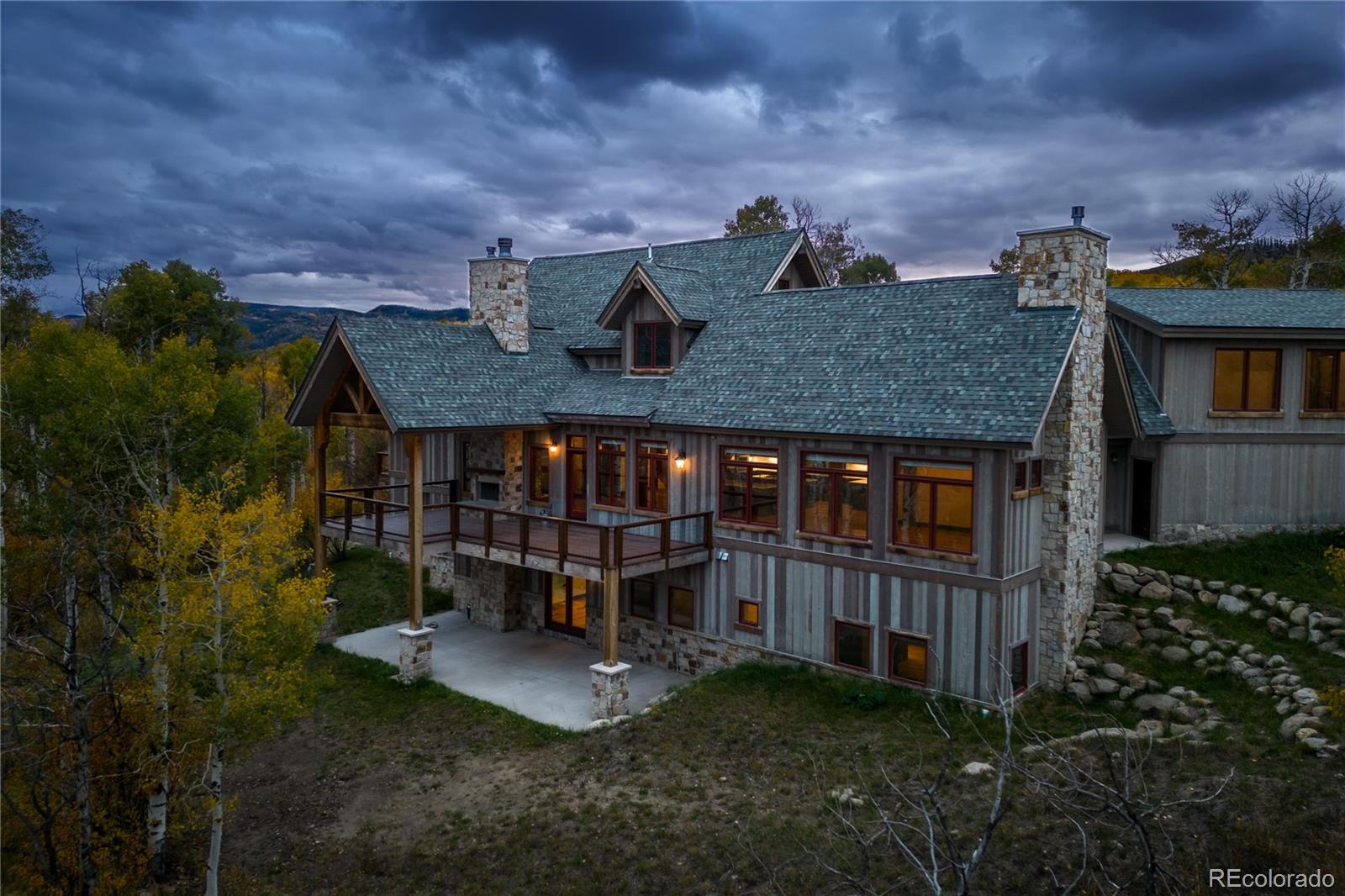 26050 Henderson Park Road Oak Creek, CO 80467 - Photo 3 of 40 an aerial view of multiple house with a yard