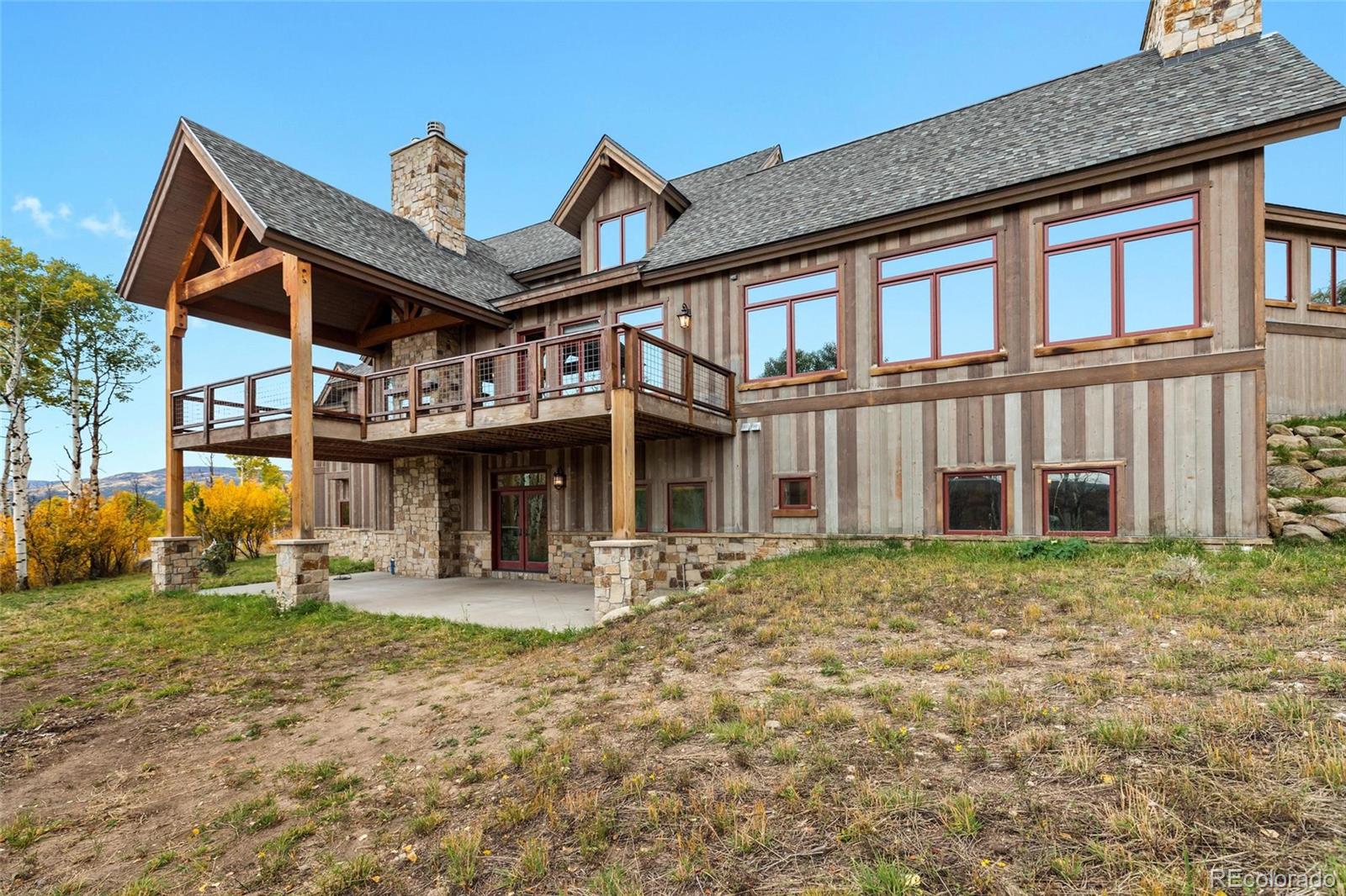 26050 Henderson Park Road Oak Creek, CO 80467 - Photo 40 of 40 a front view of a house with garden