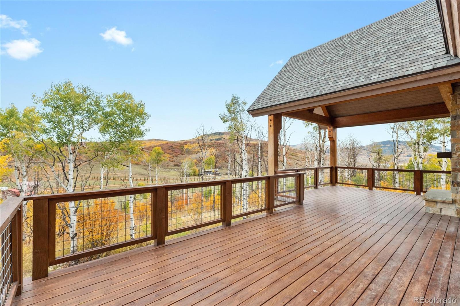 26050 Henderson Park Road Oak Creek, CO 80467 - Photo 7 of 40 a view of mountain with wooden floor