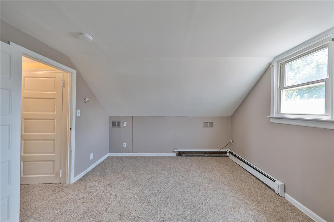 3050 Cornwall Road Bethlehem, PA 18017 - Photo 39 of 80 A versatile room with soft carpeting and natural light, perfect for an office or guest space.