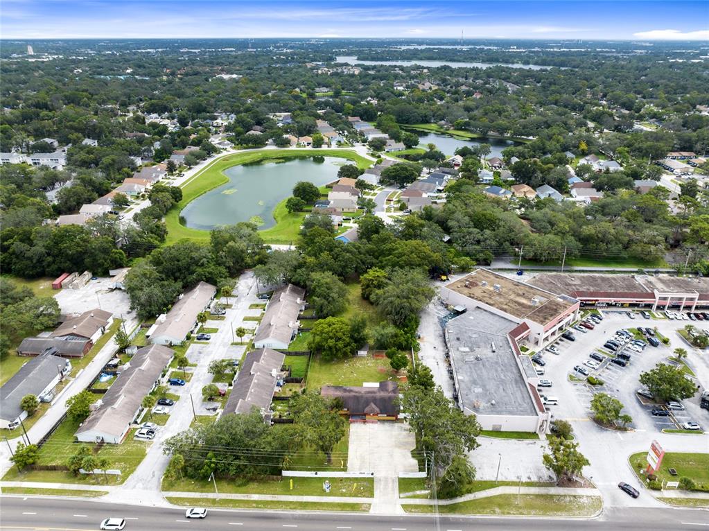 4607 North Pine Hills Road Orlando, FL 32808 - Photo 26 of 26 an aerial view of residential houses with outdoor space and parking