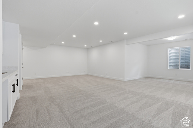 538 North Legend Circle, Unit 505 Mapleton, UT 84664 - Photo 39 of 48 Expansive room with recessed lighting, light-toned patterned carpeting, and white walls