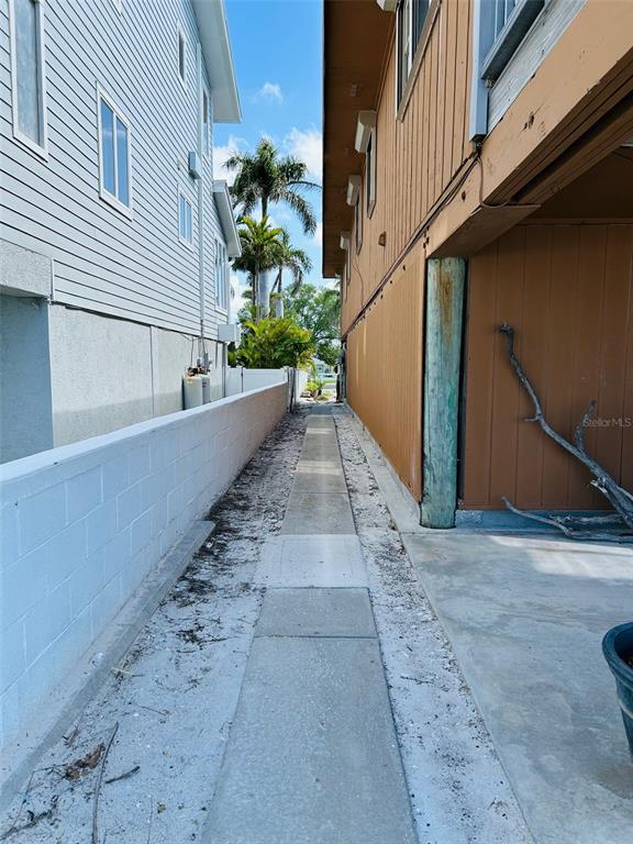 18218 Sunset Boulevard, Unit B St. Petersburg, FL 33708 - Photo 19 of 38 a view of a house with a stairs