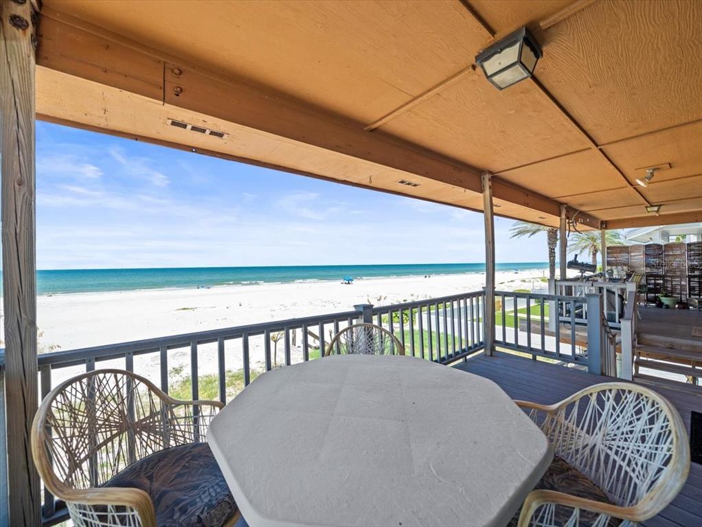 18218 Sunset Boulevard, Unit B St. Petersburg, FL 33708 - Photo 23 of 38 a view of a two chairs in the roof