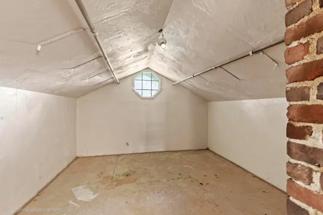 a view of a hallway with stairs