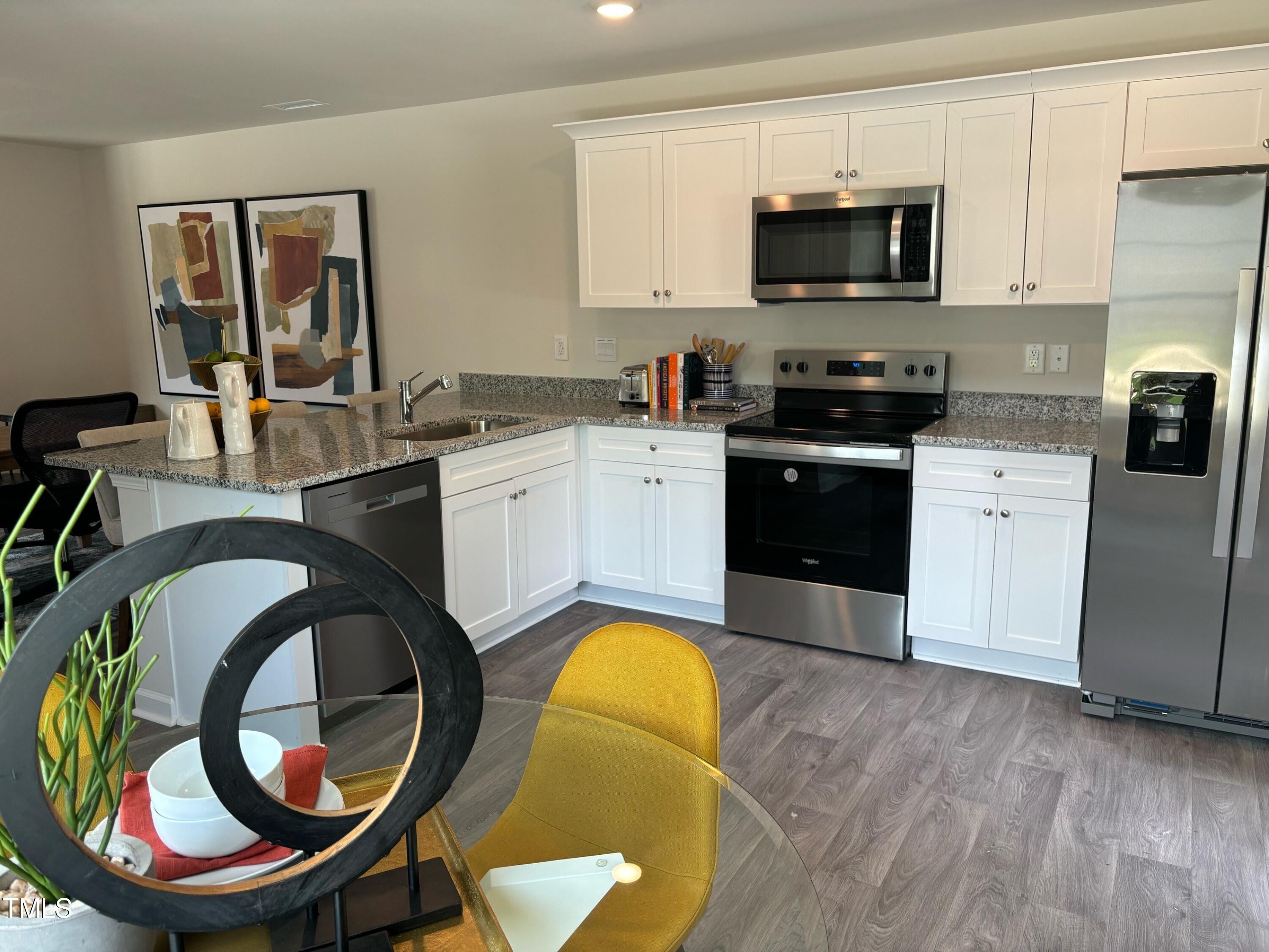 8750 Asher Gray Way Raleigh, NC 27616 - Photo 9 of 22 j kitchen