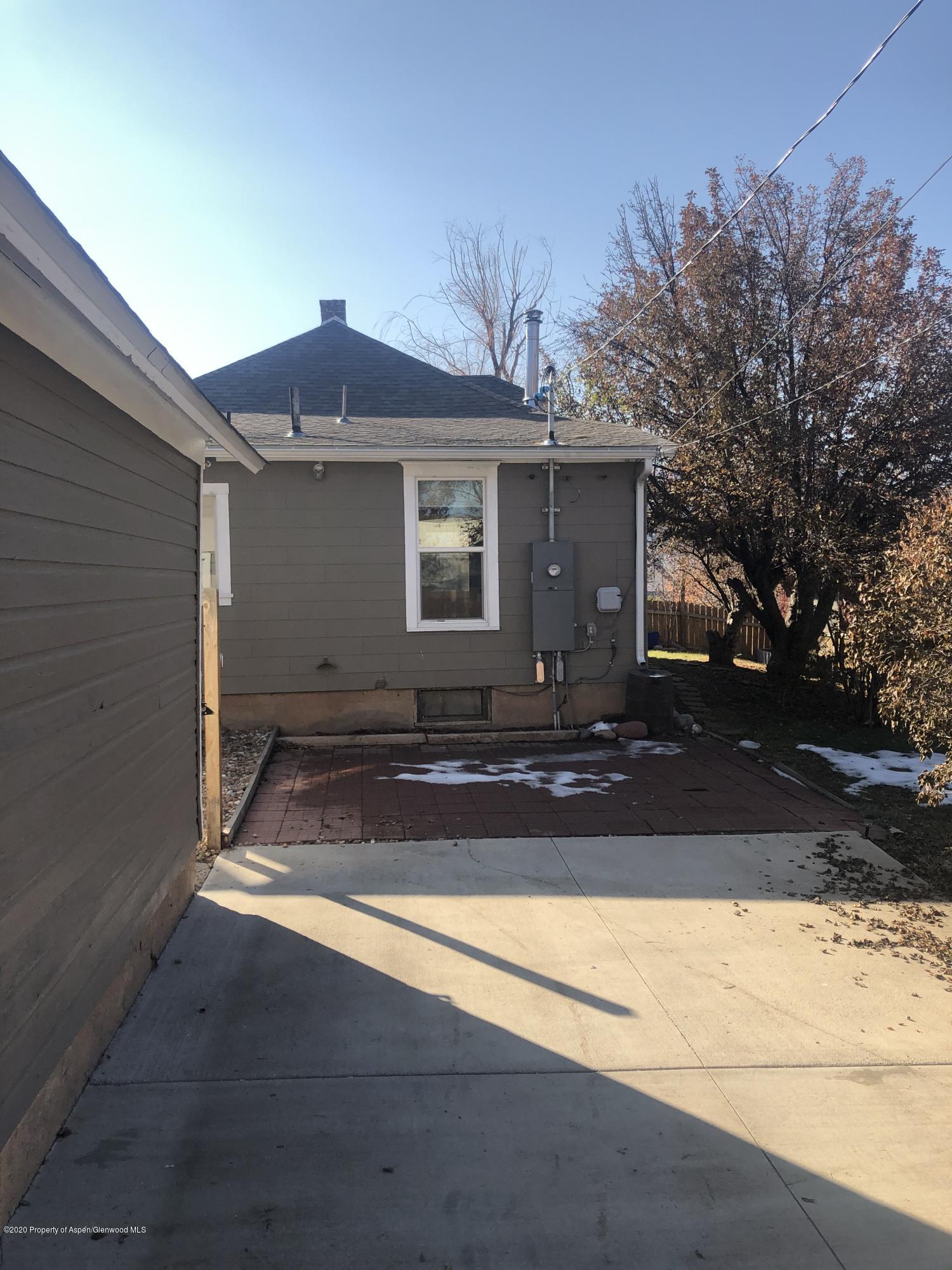 310 East 5th Street Rifle, CO 81650 - Photo 5 of 27 a front view of house with yard