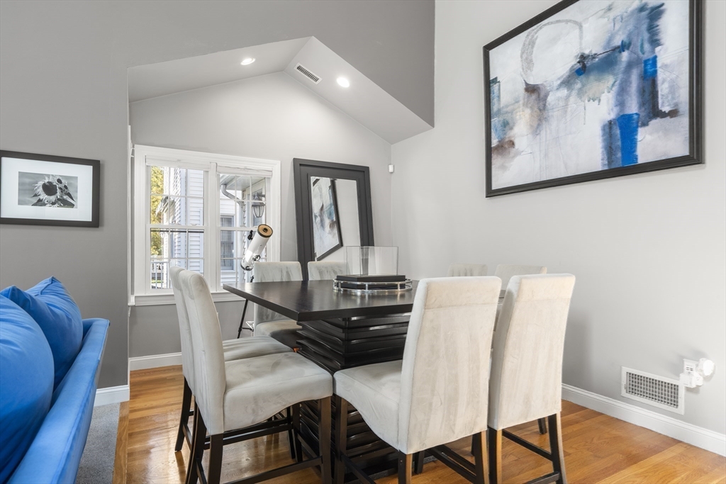 605 Middle Street, Unit 38 Braintree, MA 02184 - Photo 18 of 33 a view of a dining room with furniture and wooden floor