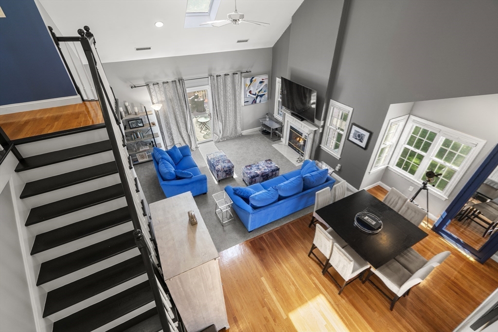 605 Middle Street, Unit 38 Braintree, MA 02184 - Photo 20 of 33 a living room with furniture and a flat screen tv