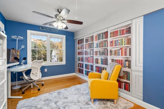a workspace with furniture and a window
