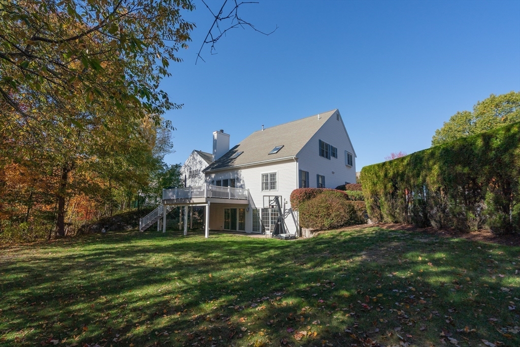 605 Middle Street, Unit 38 Braintree, MA 02184 - Photo 7 of 33 a front view of a house with a yard
