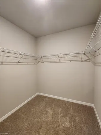 a view of a room with racks on the wall