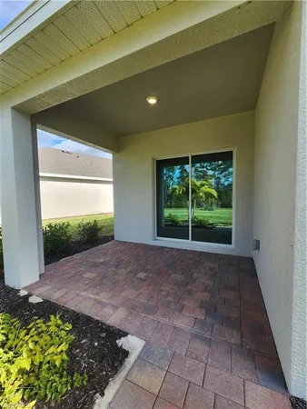 a view of a room with a large window
