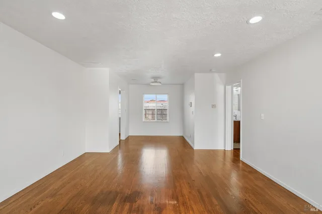 a view of livingroom with hardwood floor and window
