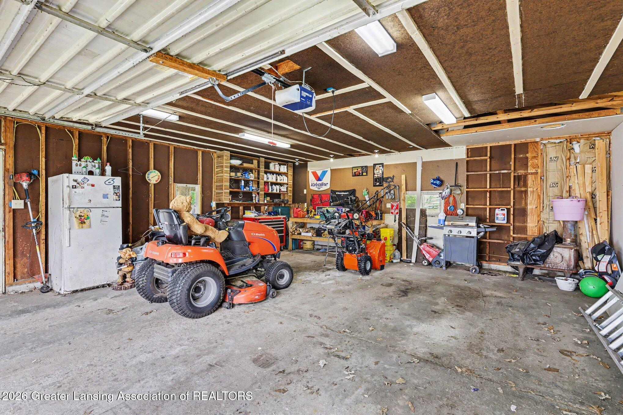 5645 Rossman Road Onondaga, MI 49264 - Photo 17 of 32 Insulated Garage