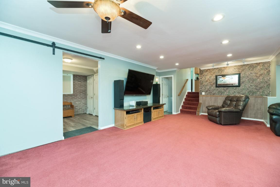 315 Stonewall Road Catonsville, MD 21228 - Photo 25 of 42 Lower Level Family Room w/ Fireplace
