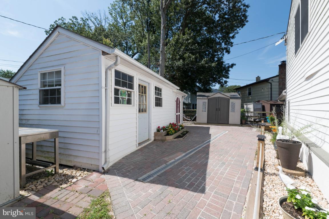 315 Stonewall Road Catonsville, MD 21228 - Photo 40 of 42 Paved Back Area w/ Powered Shed