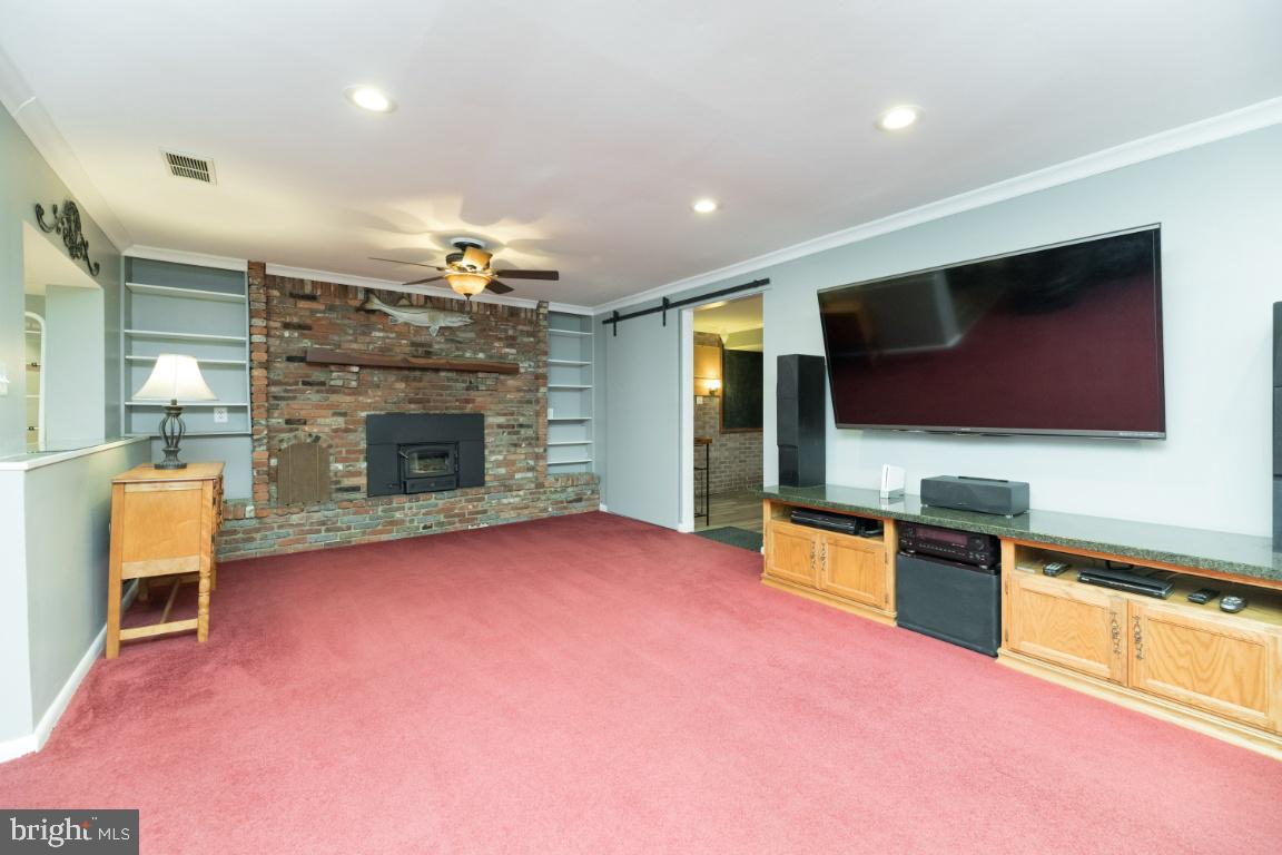 315 Stonewall Road Catonsville, MD 21228 - Photo 5 of 42 Lower Level Family Room w/ Fireplace