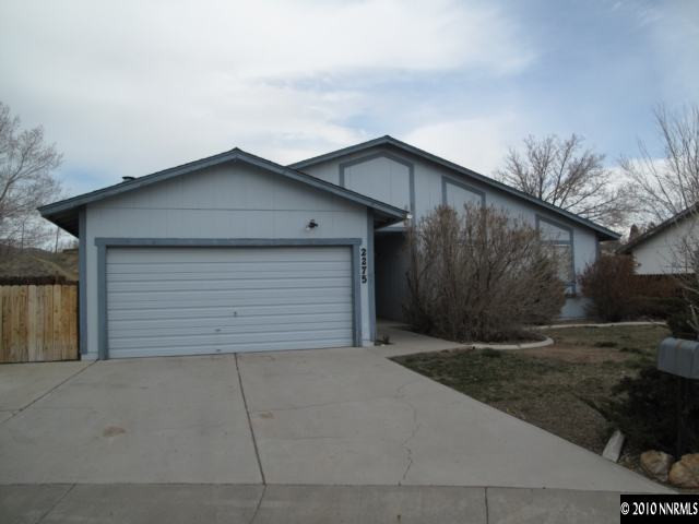 2275 Jester Court Reno, NV 89503 - Photo 1 of 4 a backyard of a house with garage