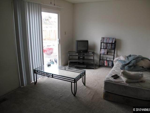 2275 Jester Court Reno, NV 89503 - Photo 4 of 4 a living room with furniture and a flat screen tv