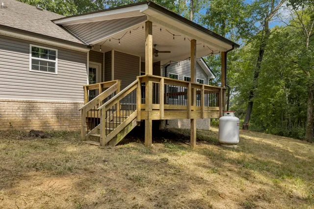 a house with trees in the background