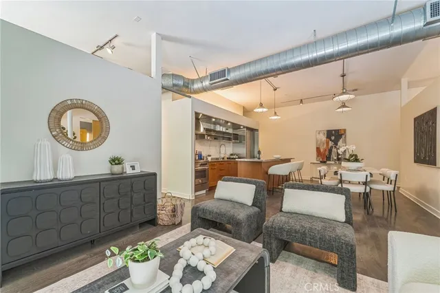 a living room with furniture and a table