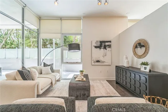 a balcony with furniture and a window