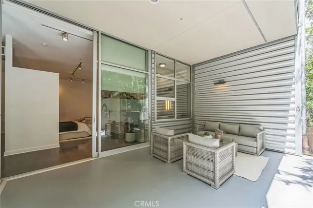 a kitchen with a sink and potted plant