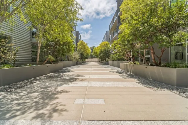 a view of a backyard of the house