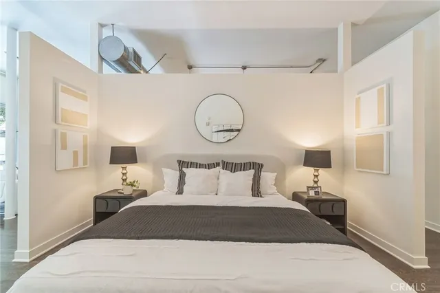 a spacious bathroom with a mirror a sink and a mirror