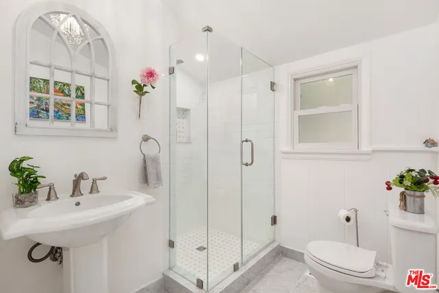 a bed room with a bed and a couch