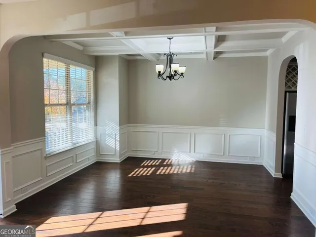 a view of a livingroom with wooden floor