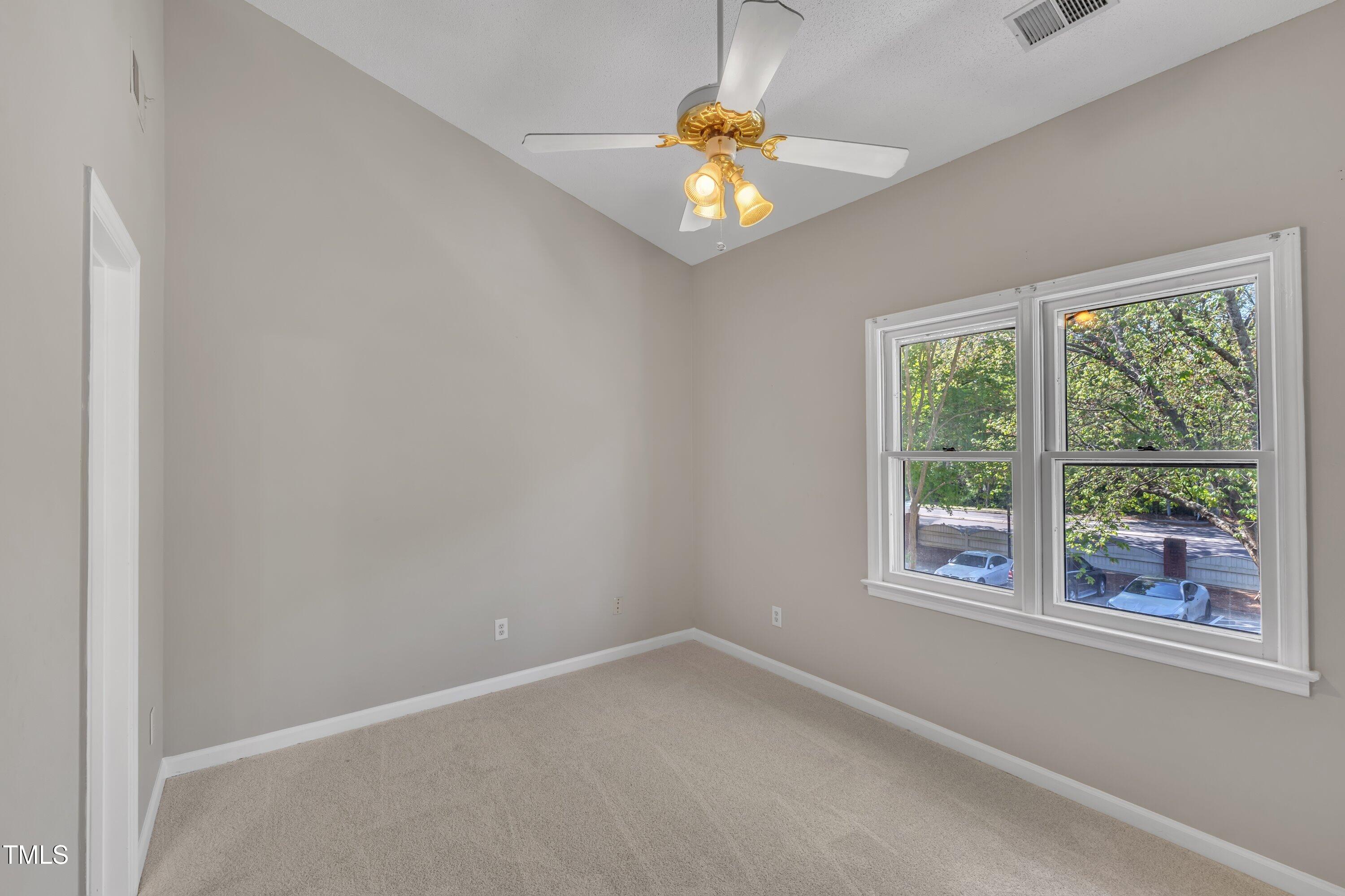 1442 Barton Pl Drive Raleigh, NC 27608 - Photo 11 of 16 an empty room with a window