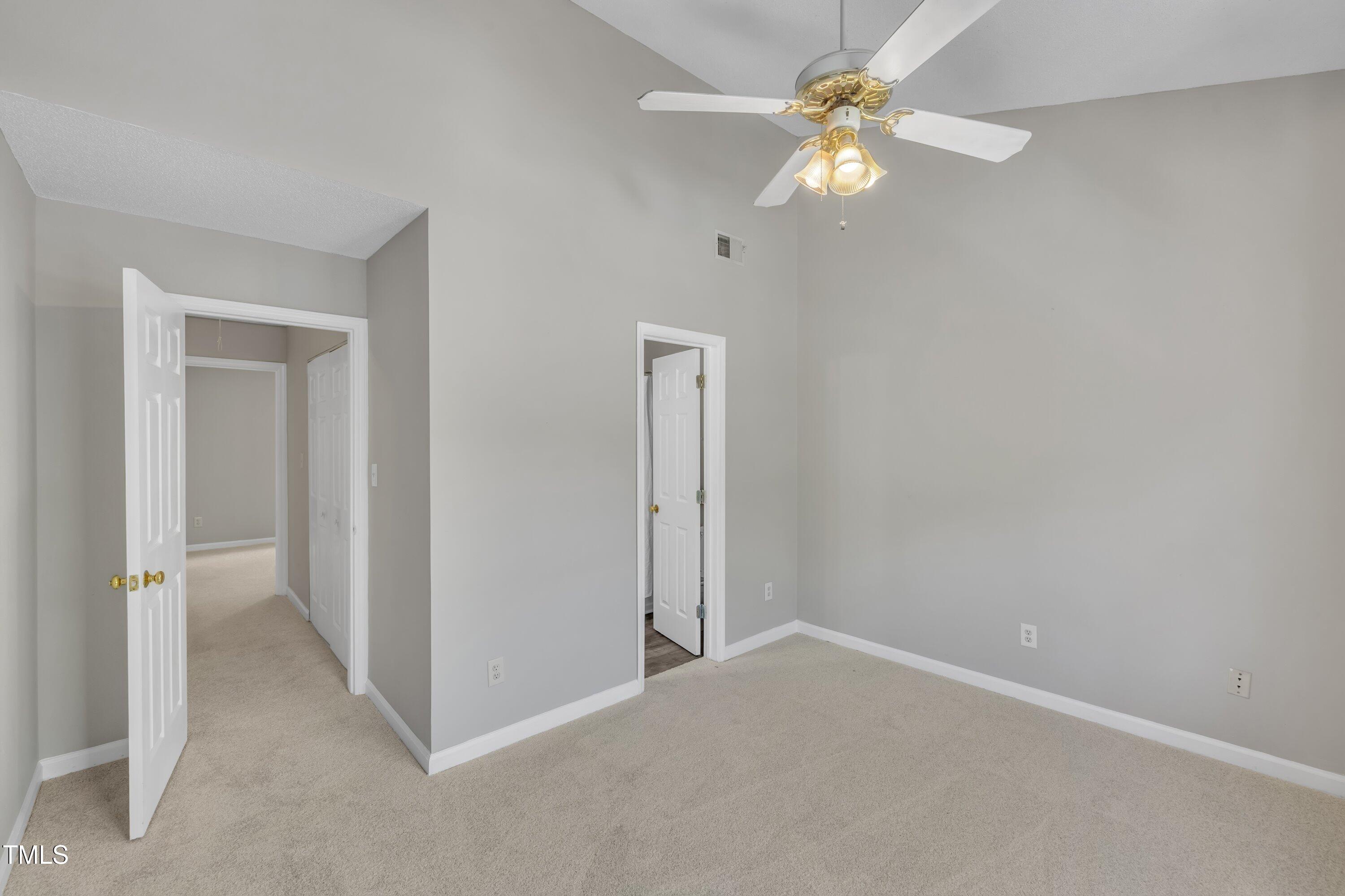 1442 Barton Pl Drive Raleigh, NC 27608 - Photo 12 of 16 a view of an empty room with a fan