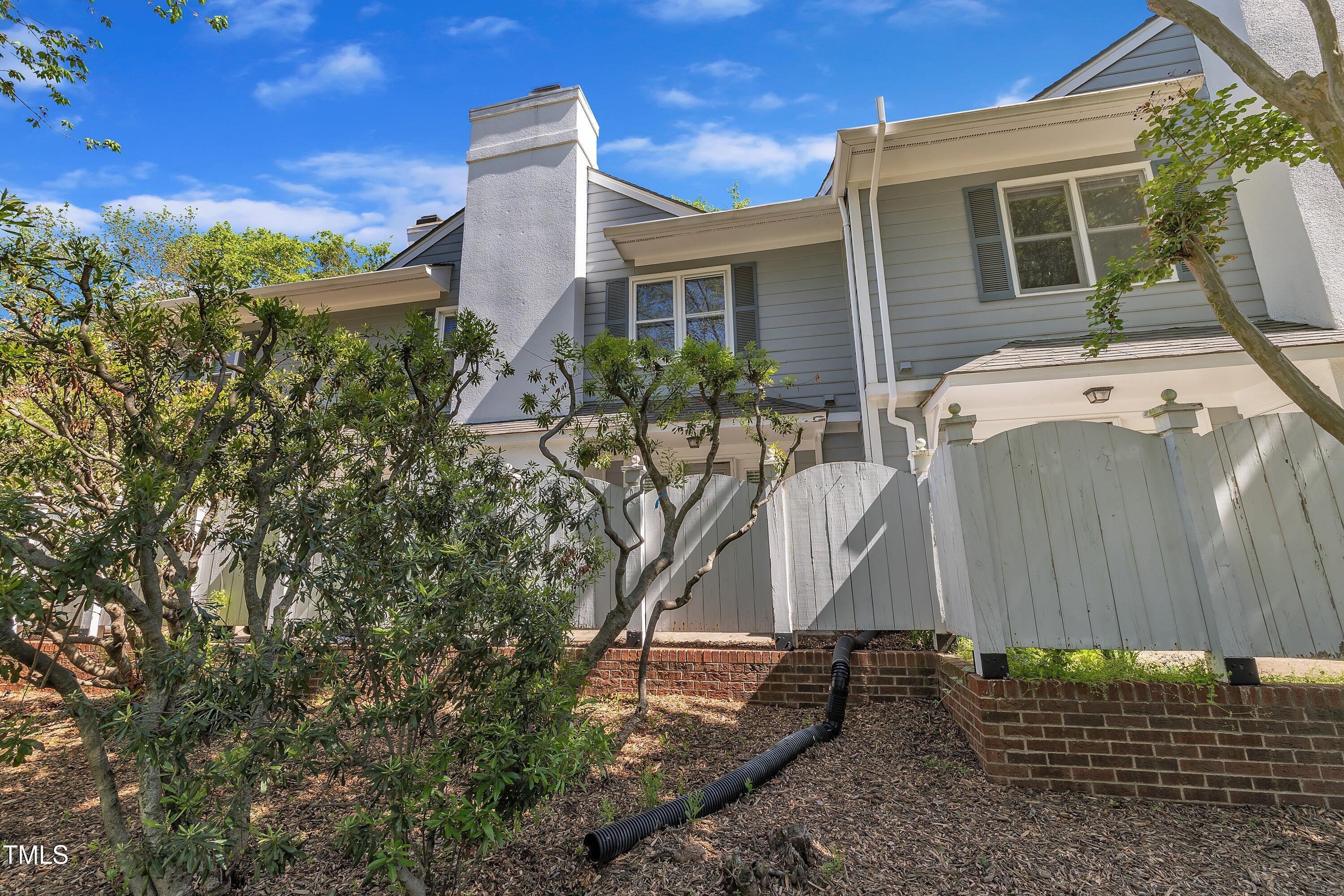 1442 Barton Pl Drive Raleigh, NC 27608 - Photo 15 of 16 a backyard of a house with lots of green space