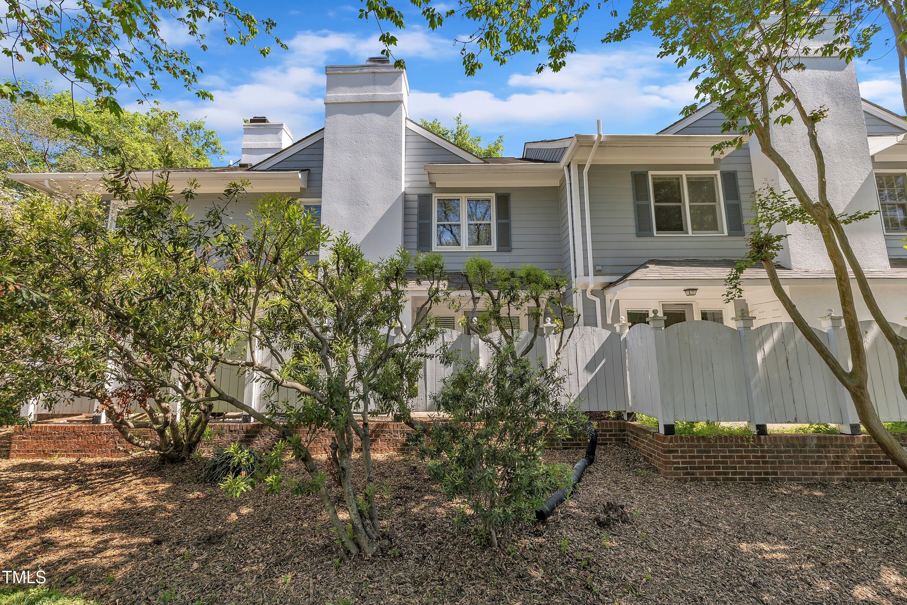 1442 Barton Pl Drive Raleigh, NC 27608 - Photo 16 of 16 front view of a house with a yard
