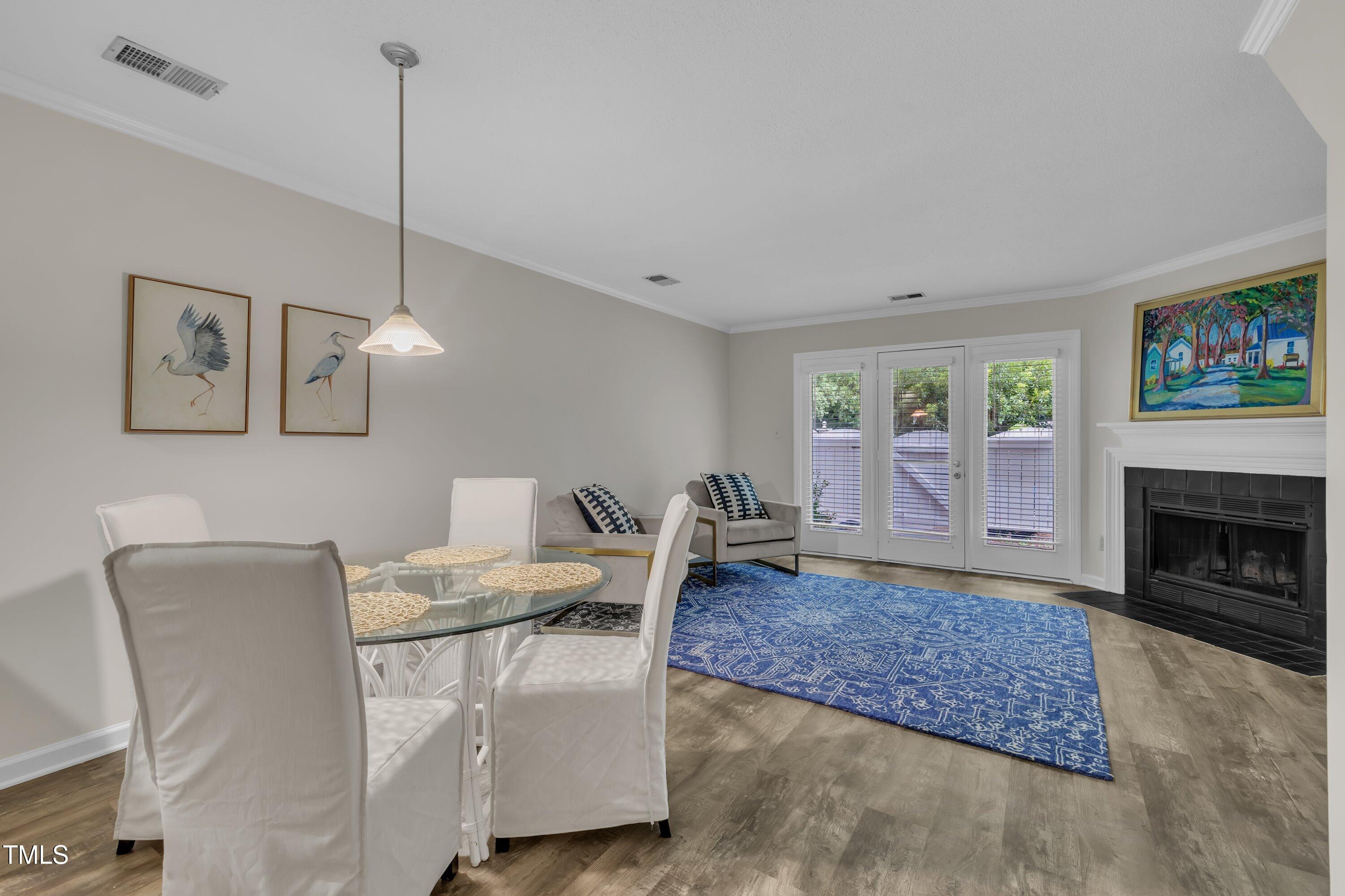 1442 Barton Pl Drive Raleigh, NC 27608 - Photo 3 of 16 a living room with furniture and a fireplace