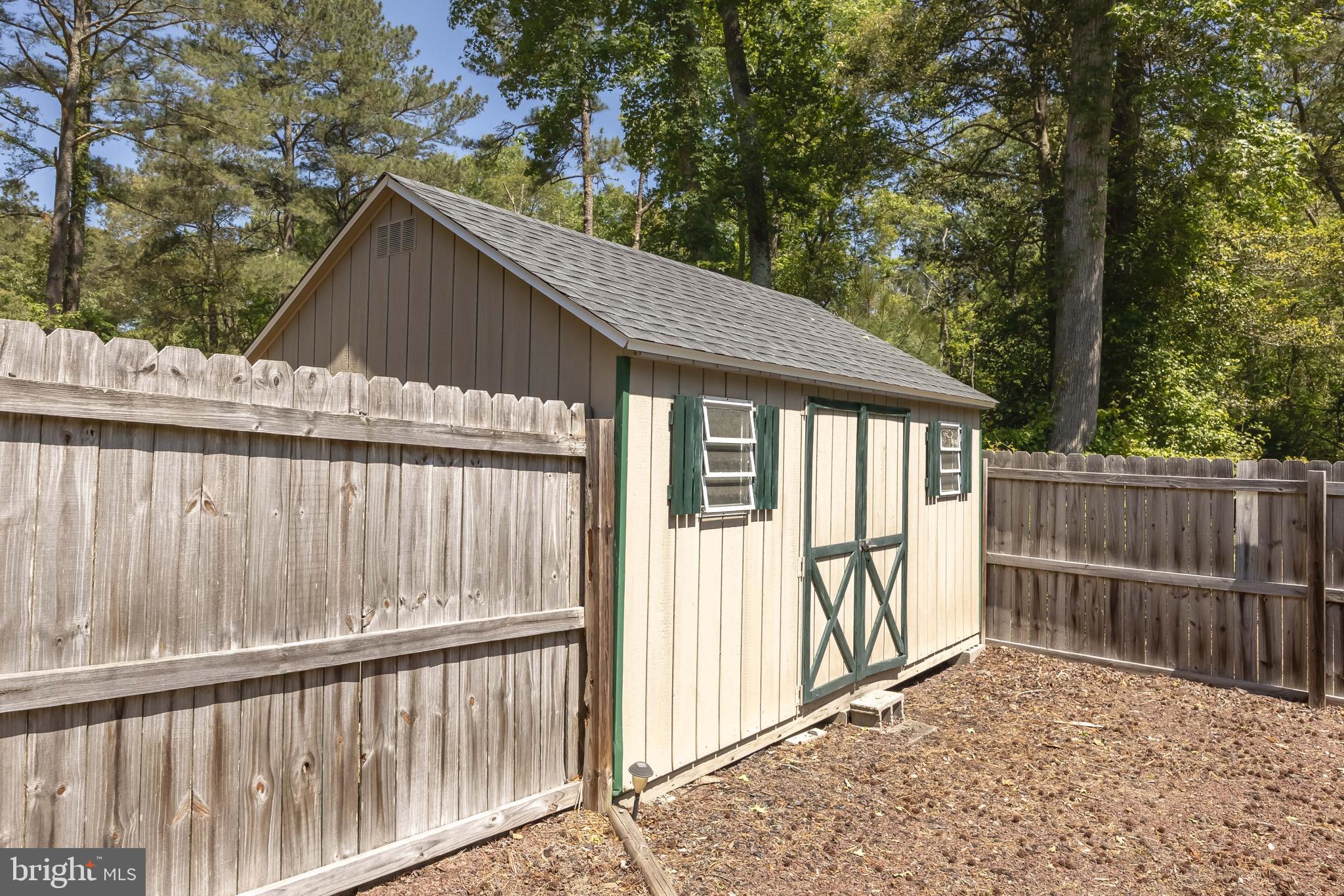 6635 Libertytown Road Berlin, MD 21811 - Photo 66 of 88 a view of wooden house with a large window and wooden fence