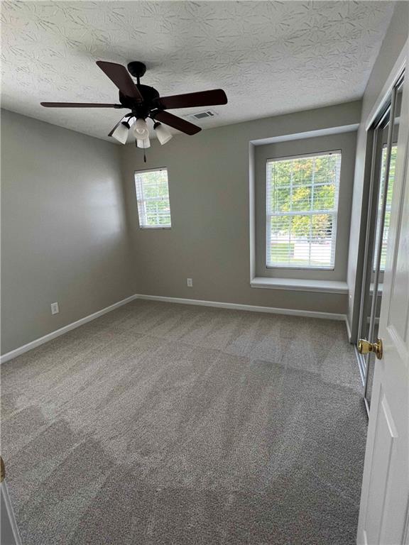 503 Sautee Place Canton, GA 30114 - Photo 13 of 17 a view of an empty room with a window