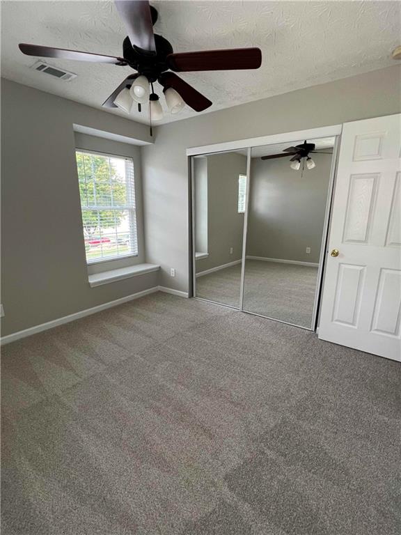 503 Sautee Place Canton, GA 30114 - Photo 14 of 17 a view of an empty room with a window