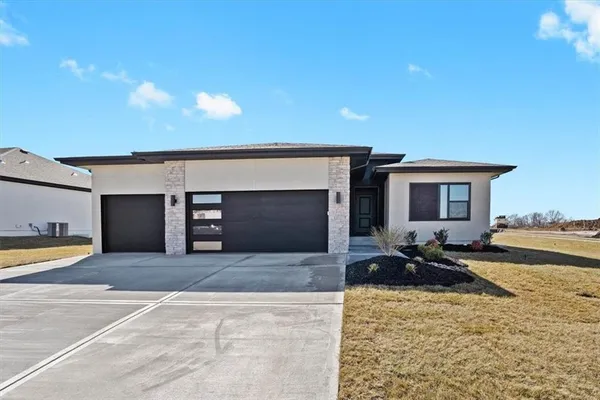 $575,000 | 1227 Larkspur Place, Raymore, MO 64083