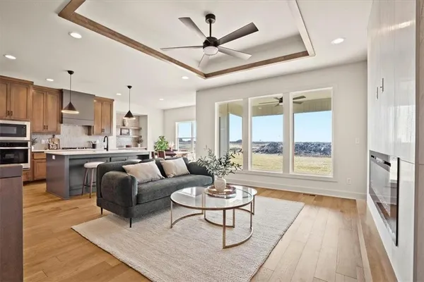 $575,000 | 1227 Larkspur Place, Raymore, MO 64083