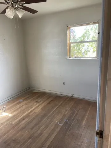 a view of a room with a window