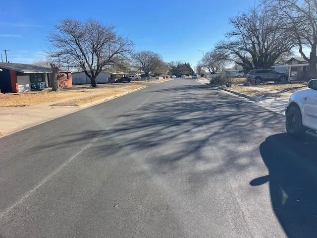 a view of road with trees
