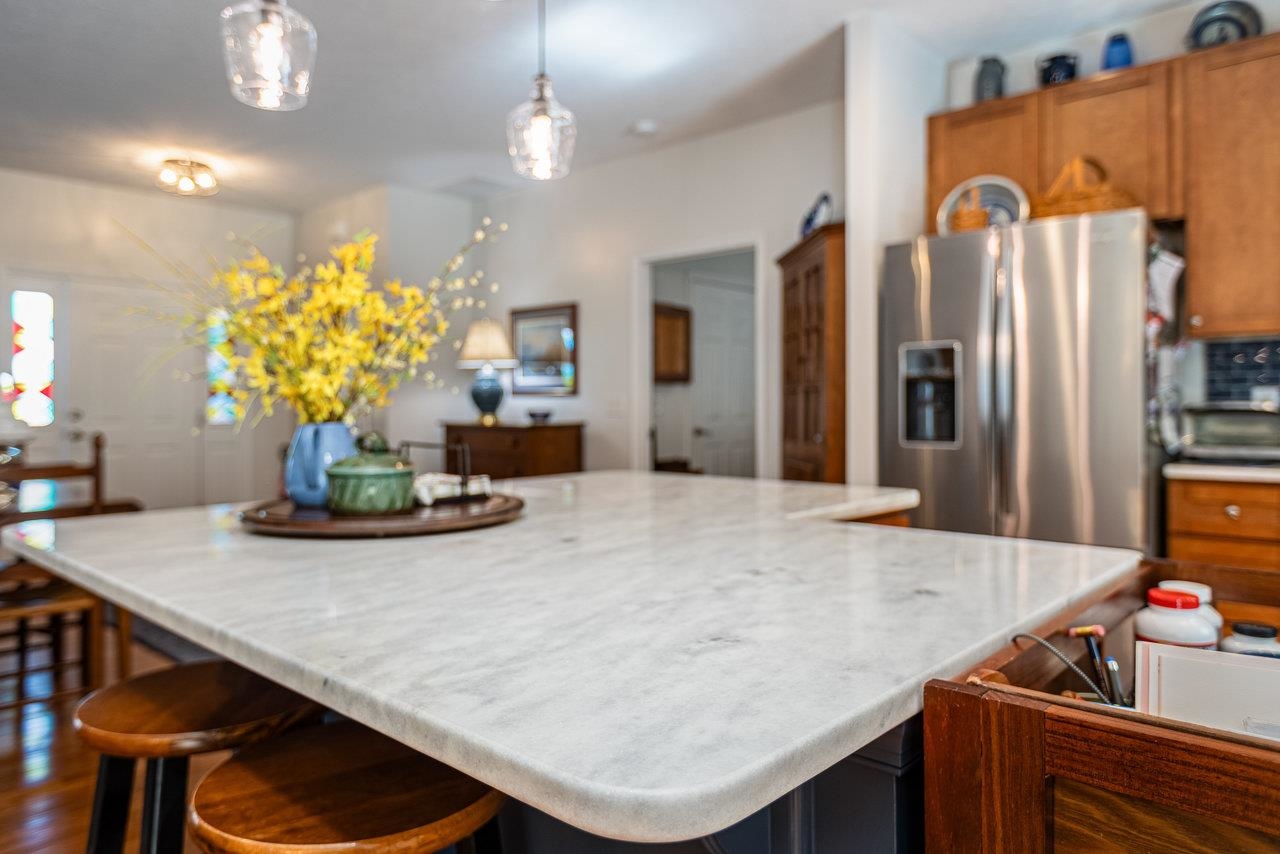 102 Millview Drive Bridgewater, VA 22812 - Photo 12 of 59 a view of kitchen island with granite countertop furniture and stainless steel appliances