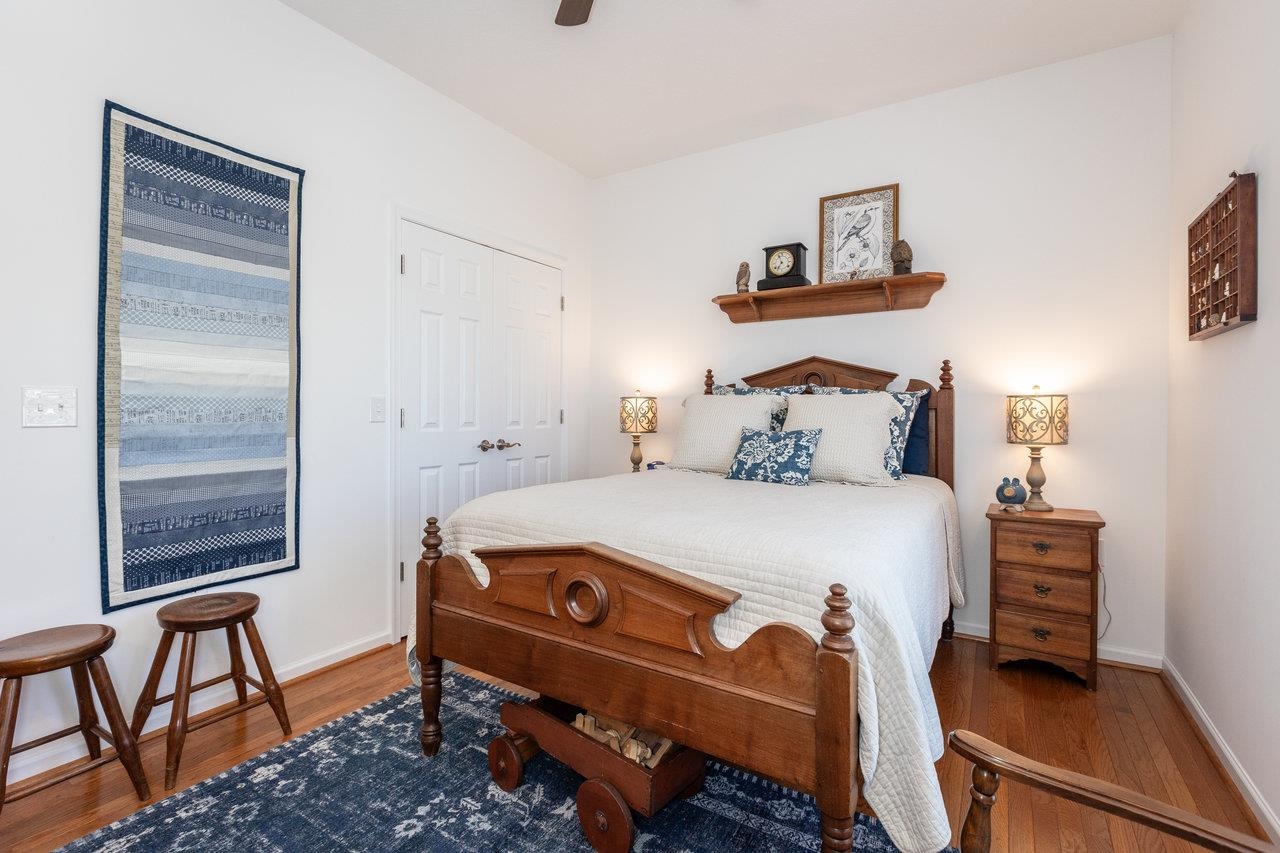 102 Millview Drive Bridgewater, VA 22812 - Photo 33 of 59 a bedroom with a bed and wooden floor