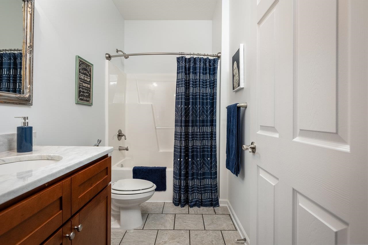 102 Millview Drive Bridgewater, VA 22812 - Photo 34 of 59 a bathroom with a granite countertop sink toilet and shower
