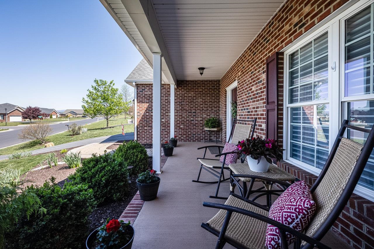 102 Millview Drive Bridgewater, VA 22812 - Photo 42 of 59 a view of a patio with chairs and potted plants